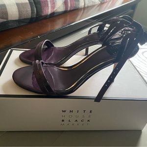 A Pair of Sandals bought a Year ago. Have been worn twice, almost Brand New!